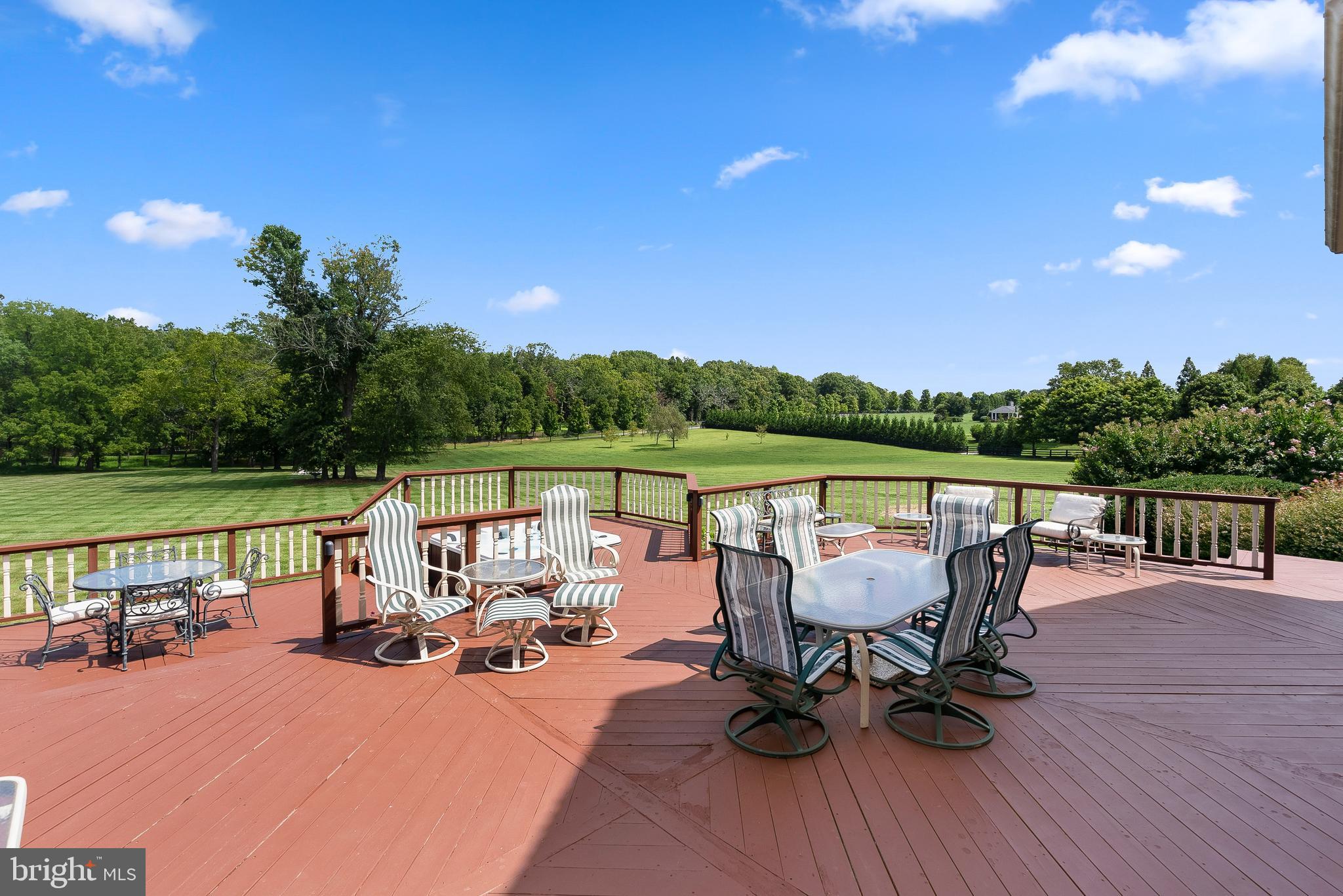 37120 Devon Wick Lane Purcellville, VA 20132 - Photo 30 of 66 a view of a lake with furniture and garden