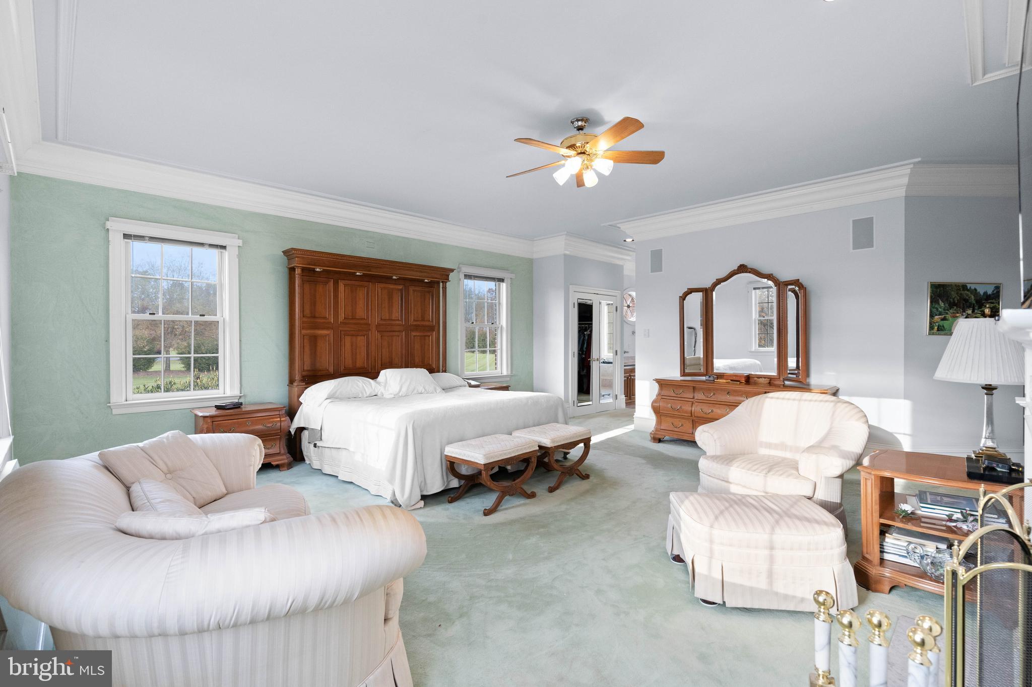 37120 Devon Wick Lane Purcellville, VA 20132 - Photo 35 of 66 a spacious bedroom with a bed and window