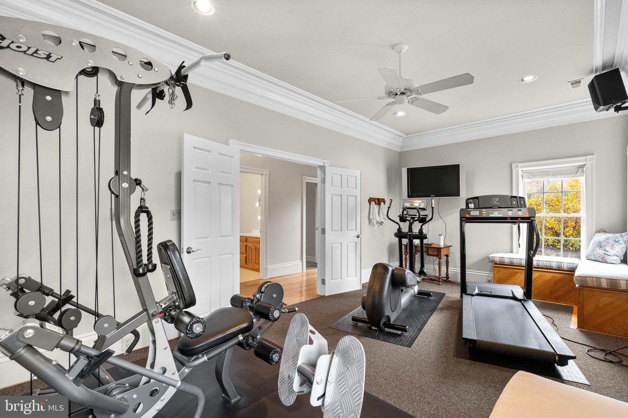 37120 Devon Wick Lane Purcellville, VA 20132 - Photo 47 of 66 a view of a livingroom with furniture and a flat screen tv