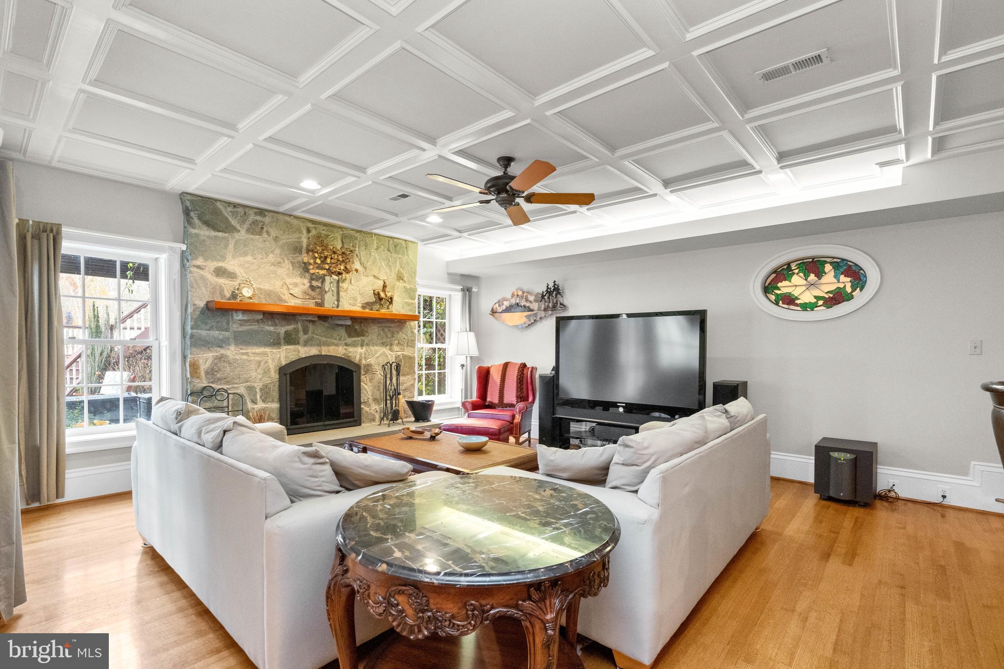 37120 Devon Wick Lane Purcellville, VA 20132 - Photo 49 of 66 a living room with furniture and a fireplace