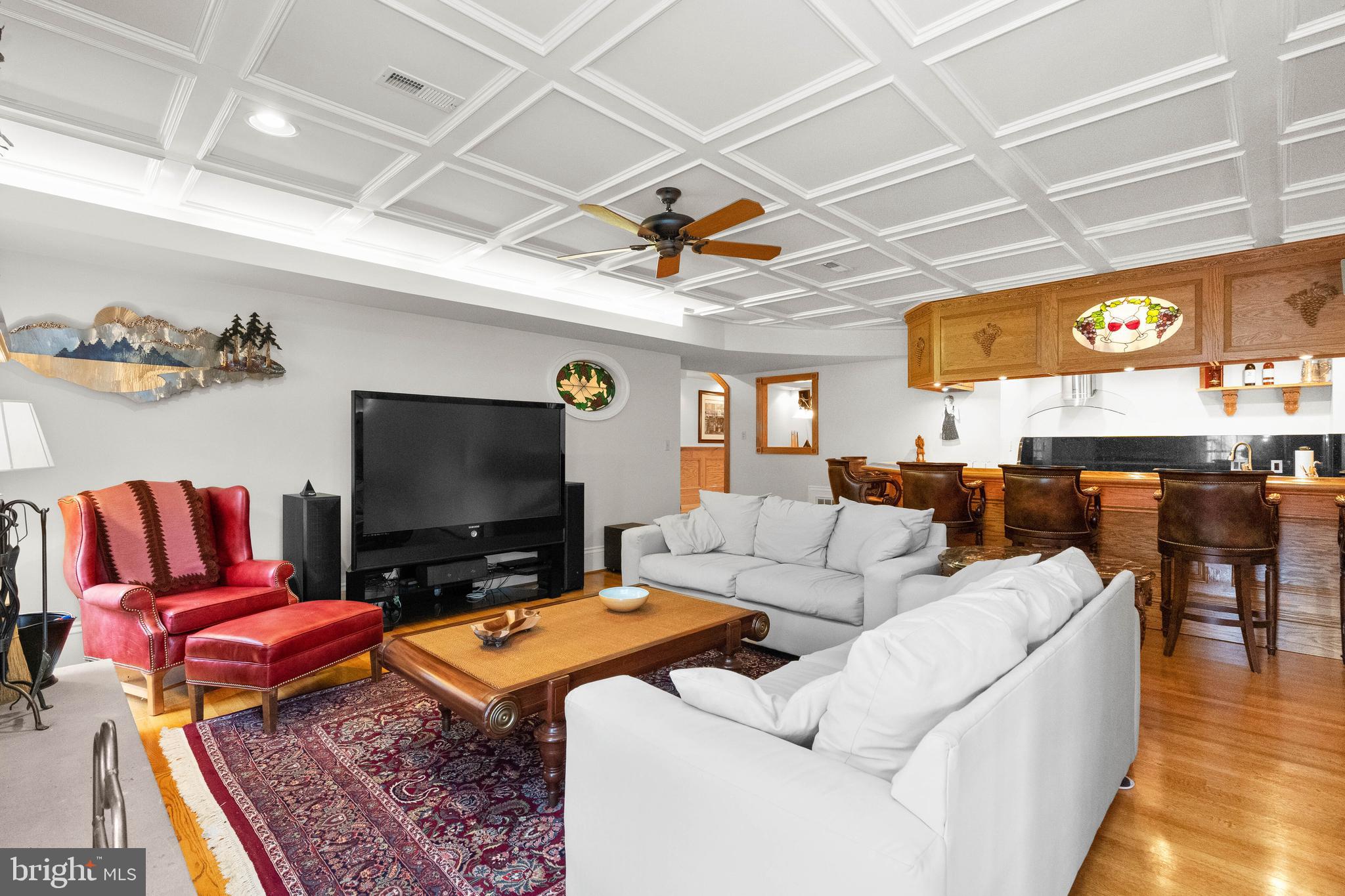 37120 Devon Wick Lane Purcellville, VA 20132 - Photo 50 of 66 a living room with furniture and a flat screen tv
