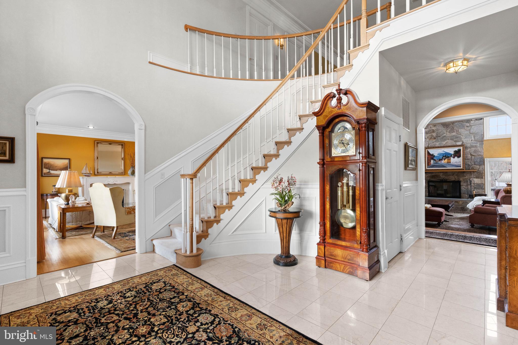 37120 Devon Wick Lane Purcellville, VA 20132 - Photo 10 of 66 a view of entryway and hall with wooden floor
