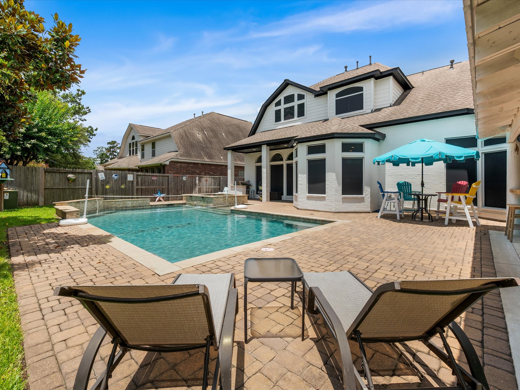 5910 Center Ct Drive Spring, TX 77379 - Photo 40 of 50 Imagine slow mornings by the water, afternoons spent lounging poolside, and evenings gathered under the pavilion as the backyard becomes the backdrop for everyday memories and special celebrations alike.