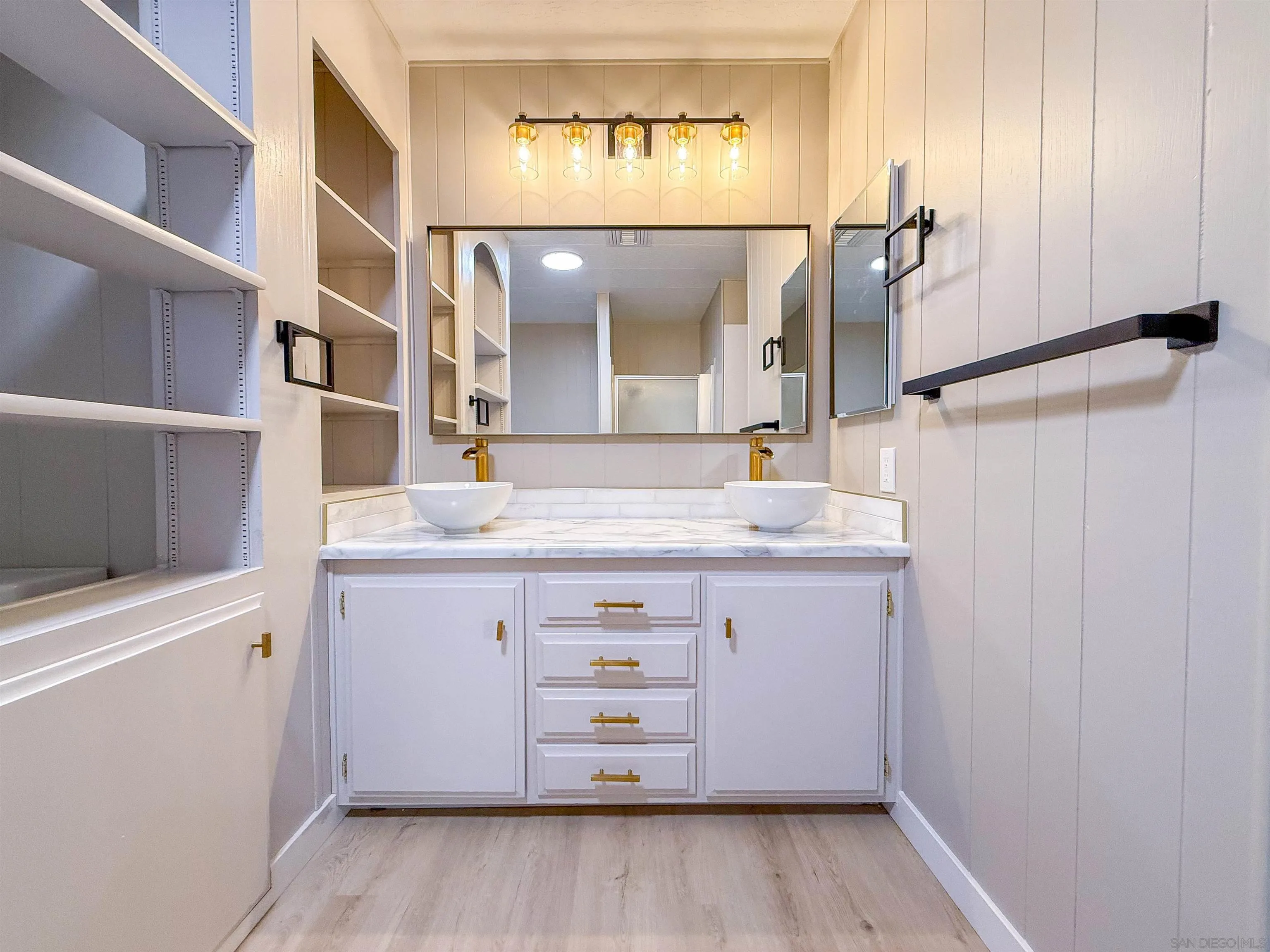 1212 H Street Ramona, CA 92065 - Photo 19 of 31 a bathroom with a sink and a mirror