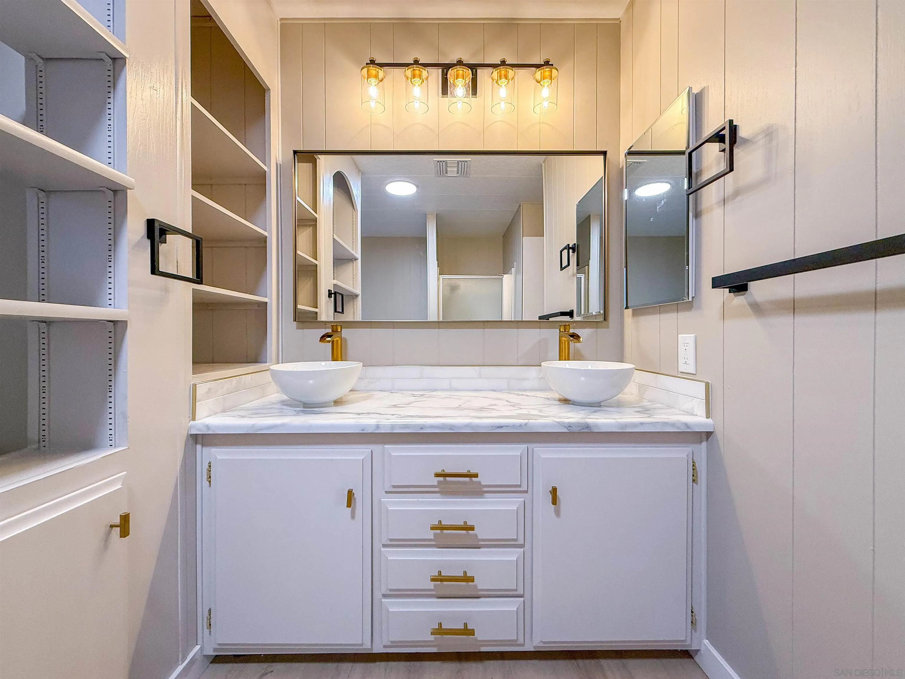 1212 H Street Ramona, CA 92065 - Photo 20 of 31 a bathroom with a granite countertop sink and a mirror
