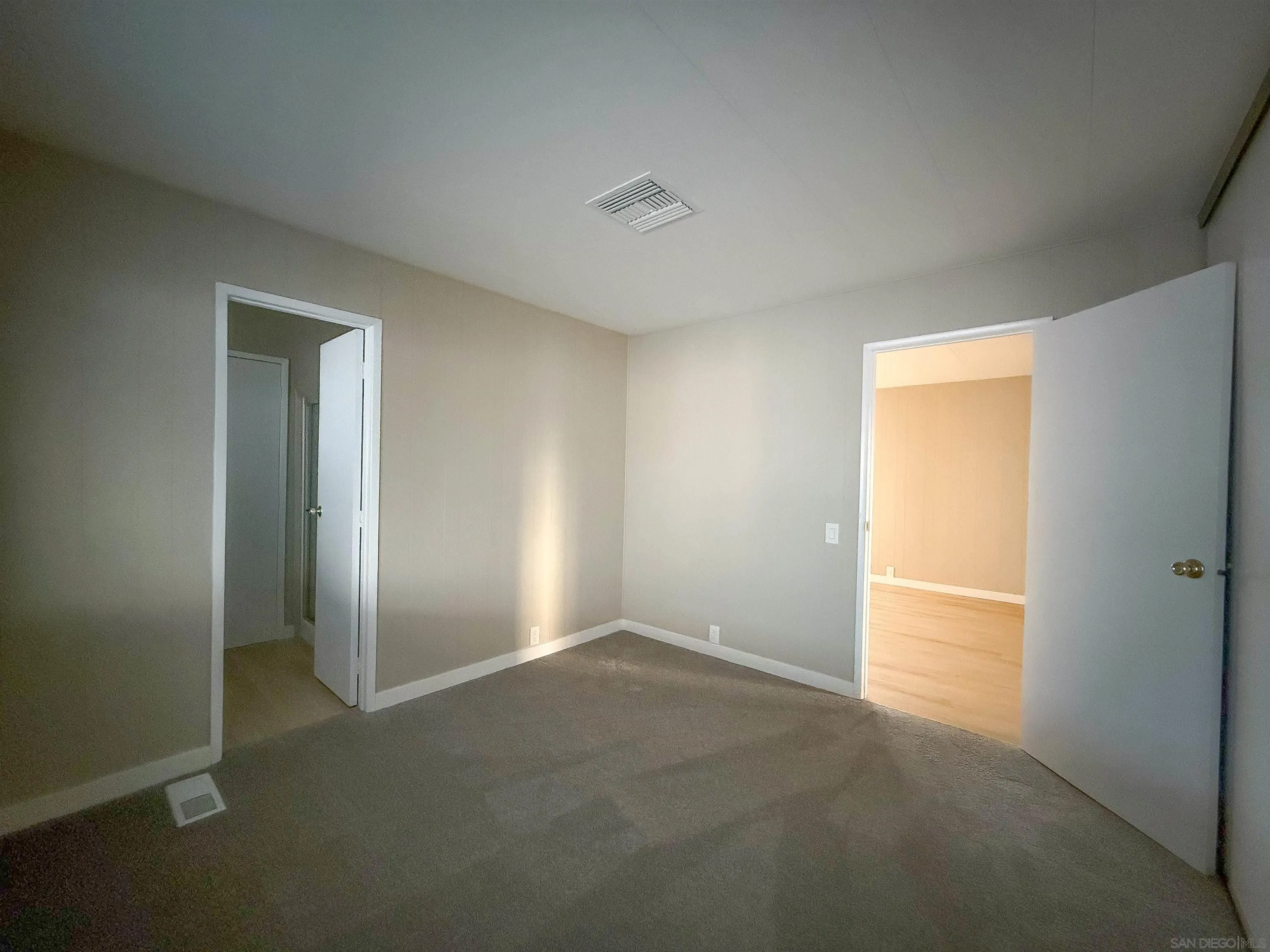1212 H Street Ramona, CA 92065 - Photo 21 of 31 an empty room with windows