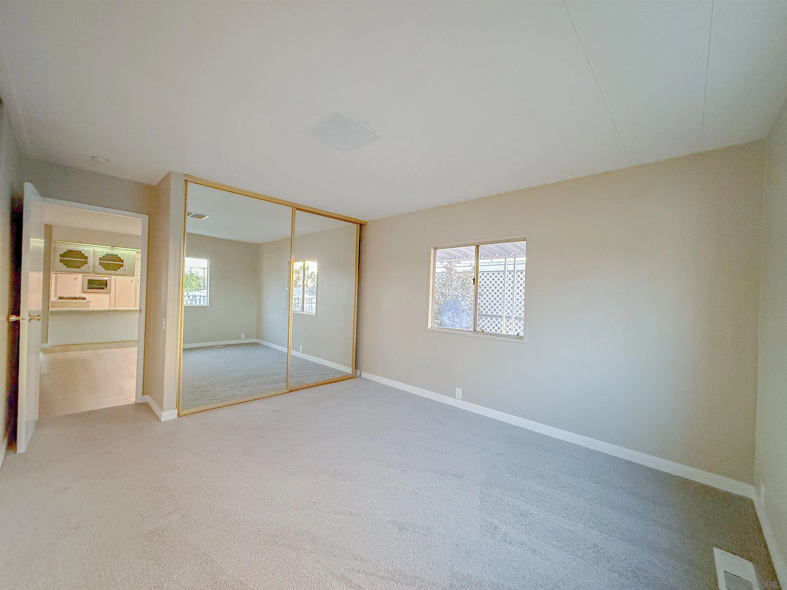 1212 H Street Ramona, CA 92065 - Photo 22 of 31 a view of an empty room and window