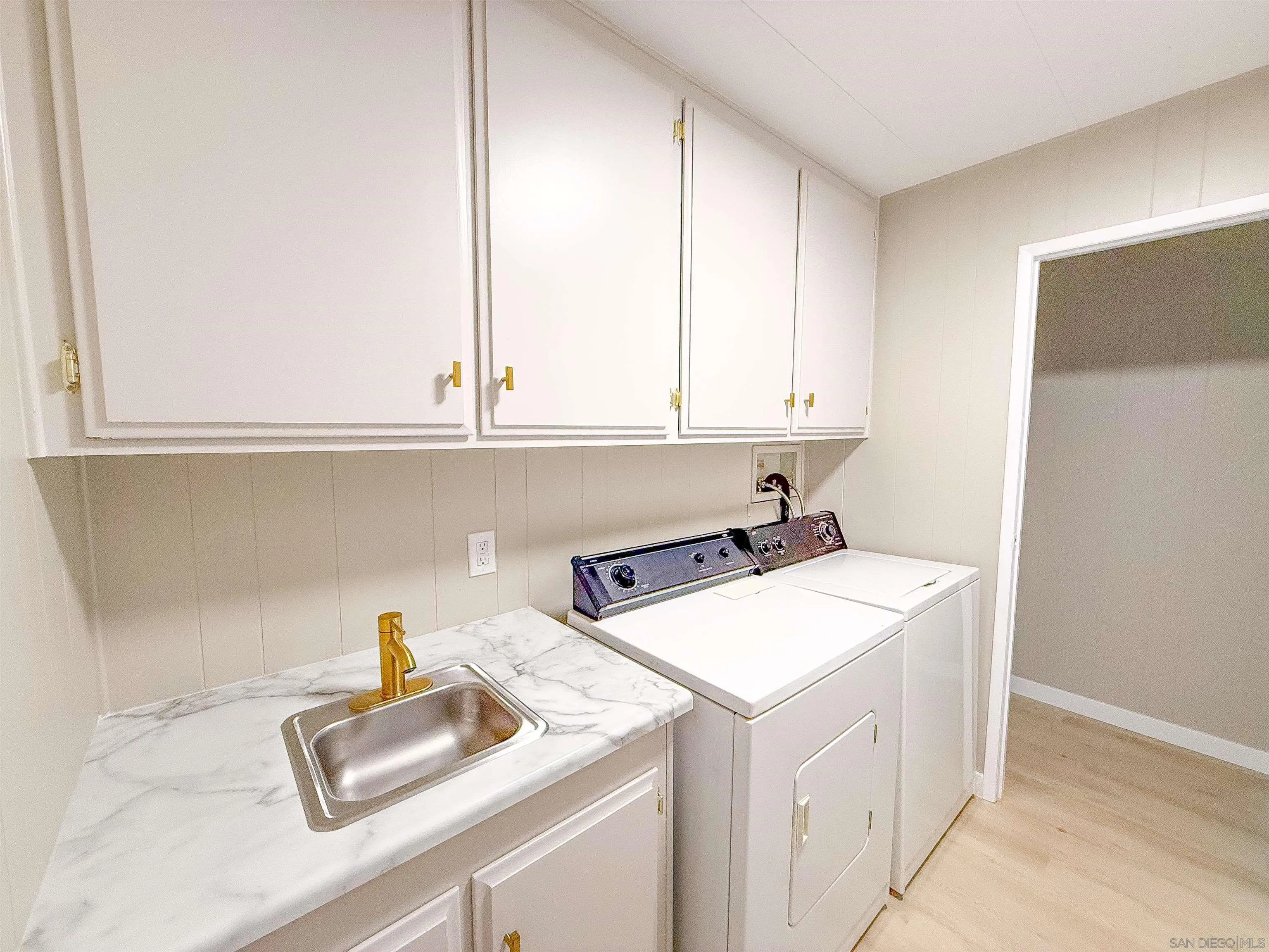 1212 H Street Ramona, CA 92065 - Photo 26 of 31 a utility room with sink dryer and washer