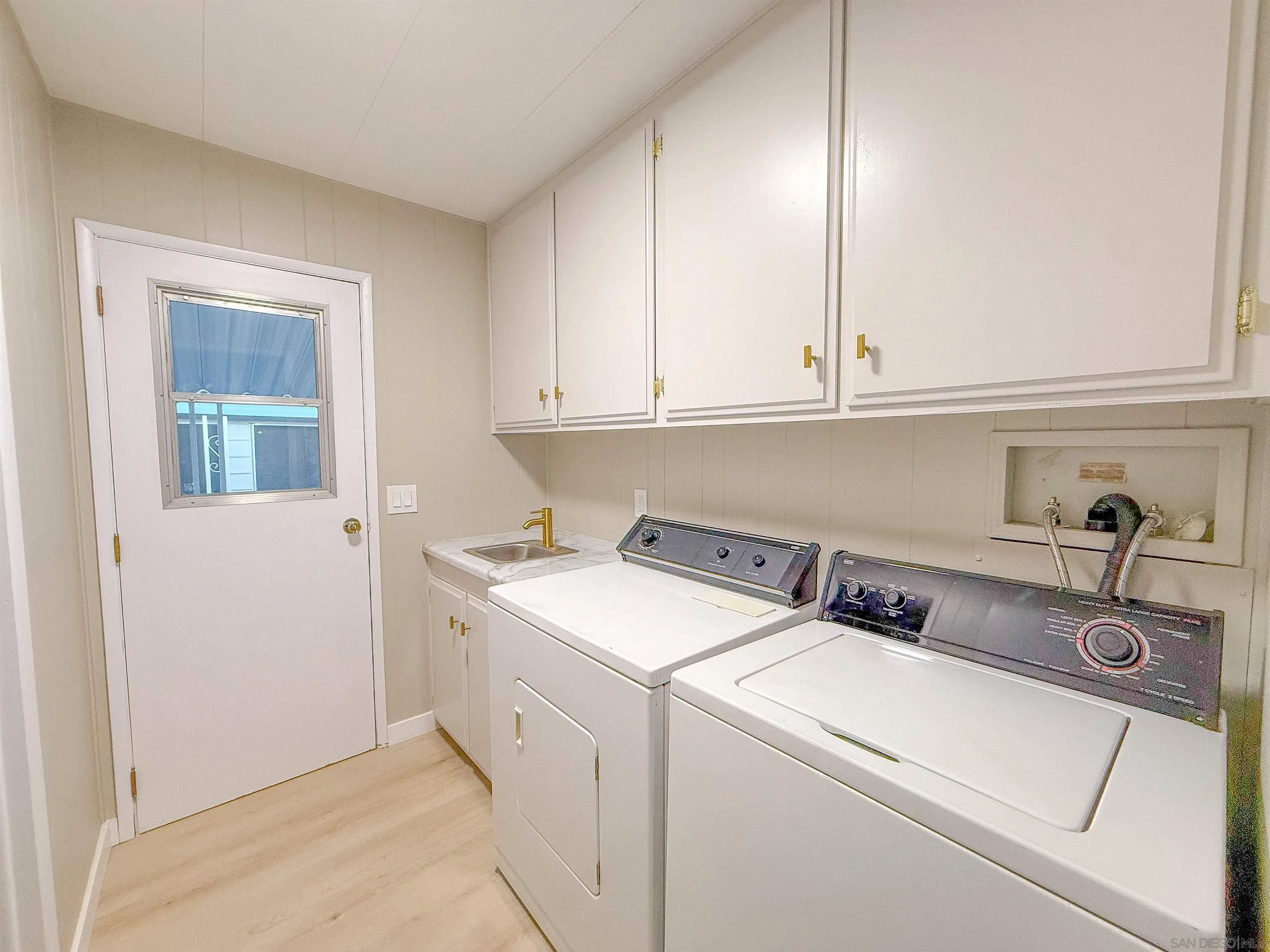 1212 H Street Ramona, CA 92065 - Photo 27 of 31 a utility room with dryer and washer