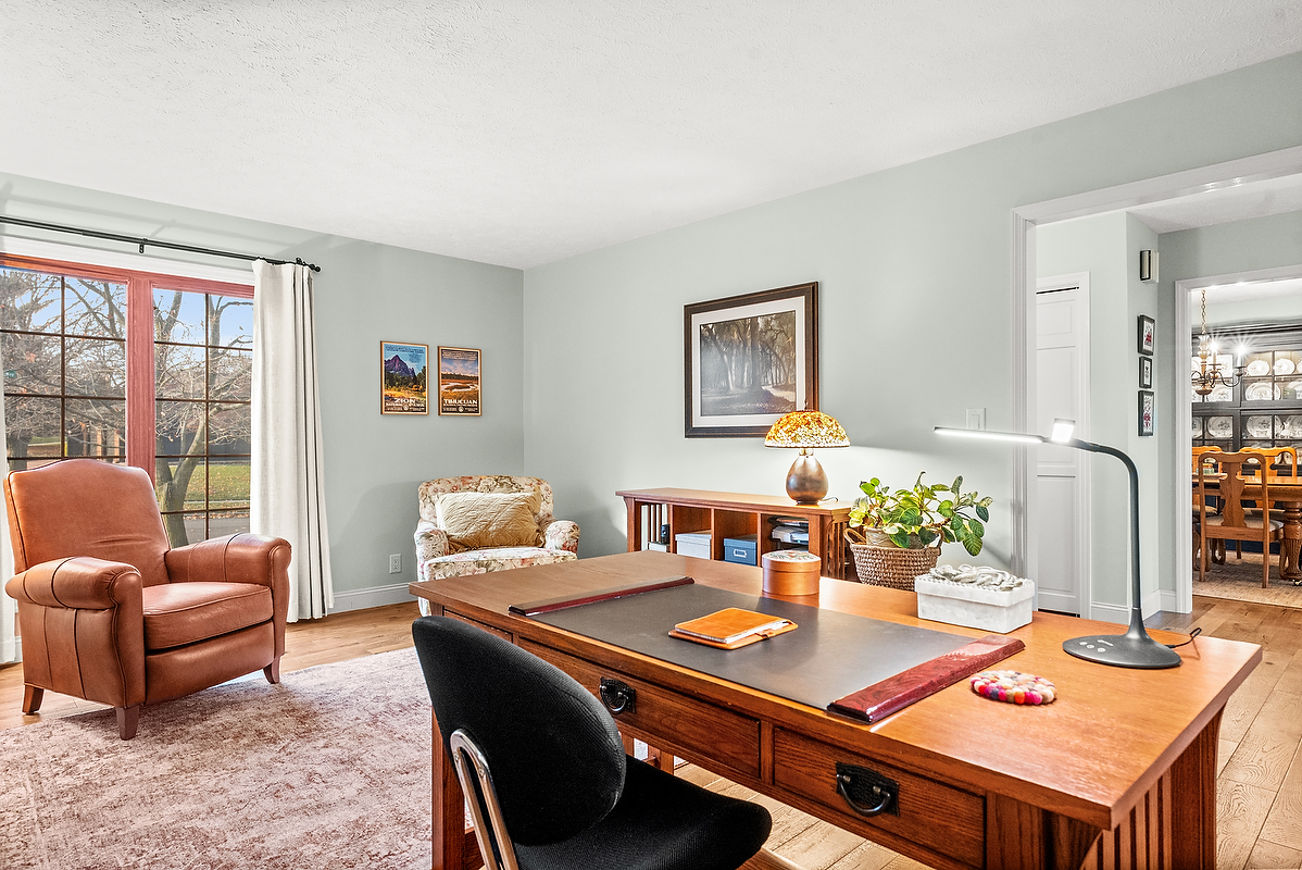 21 Pendleton Way Bloomington, IL 61704 - Photo 11 of 55 a view of a workspace with furniture and a couch