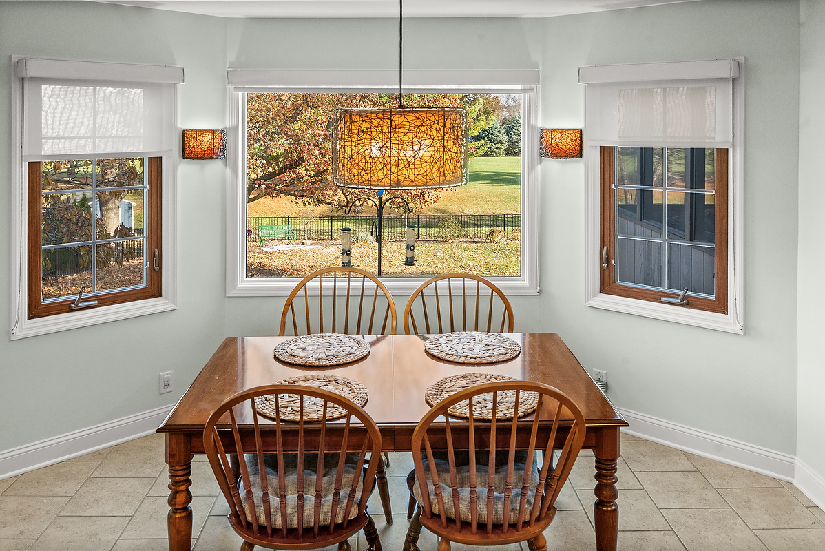 21 Pendleton Way Bloomington, IL 61704 - Photo 13 of 55 a view of a dining room with furniture window and outside view