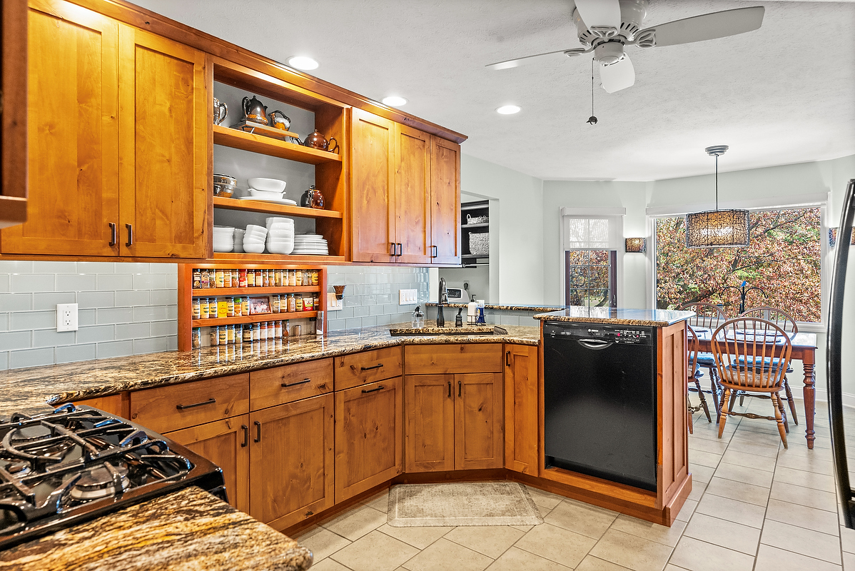 21 Pendleton Way Bloomington, IL 61704 - Photo 14 of 55 a kitchen with stainless steel appliances granite countertop a refrigerator and a sink