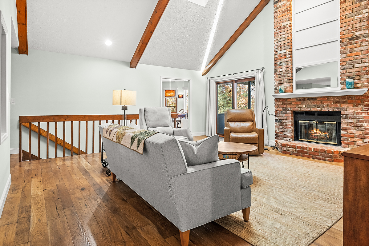 21 Pendleton Way Bloomington, IL 61704 - Photo 17 of 55 a living room with furniture and a fireplace