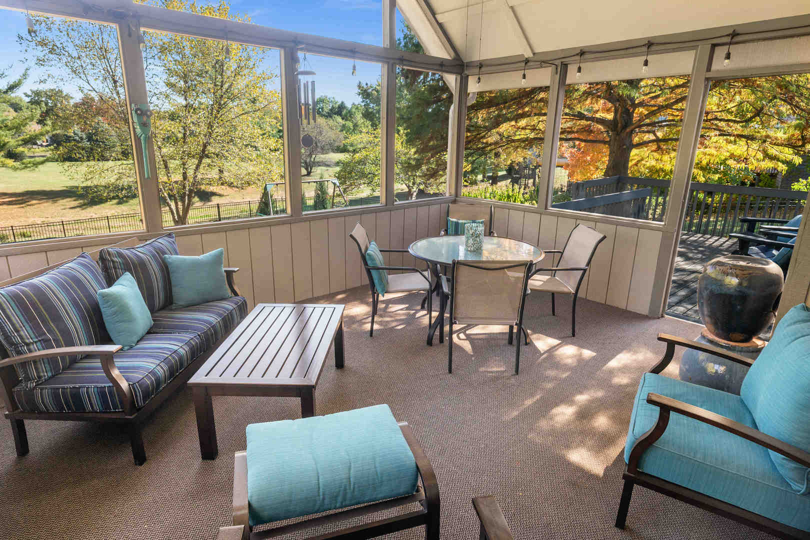 21 Pendleton Way Bloomington, IL 61704 - Photo 21 of 55 a dining room with furniture and a floor to ceiling window