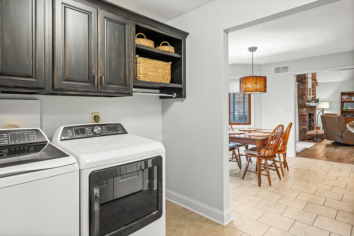 21 Pendleton Way Bloomington, IL 61704 - Photo 26 of 55 a utility room with dryer washer and a view of kitchen