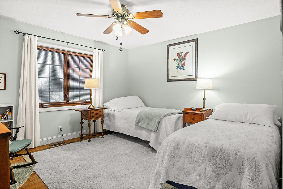 21 Pendleton Way Bloomington, IL 61704 - Photo 33 of 55 a bedroom with two beds and painting on the wall