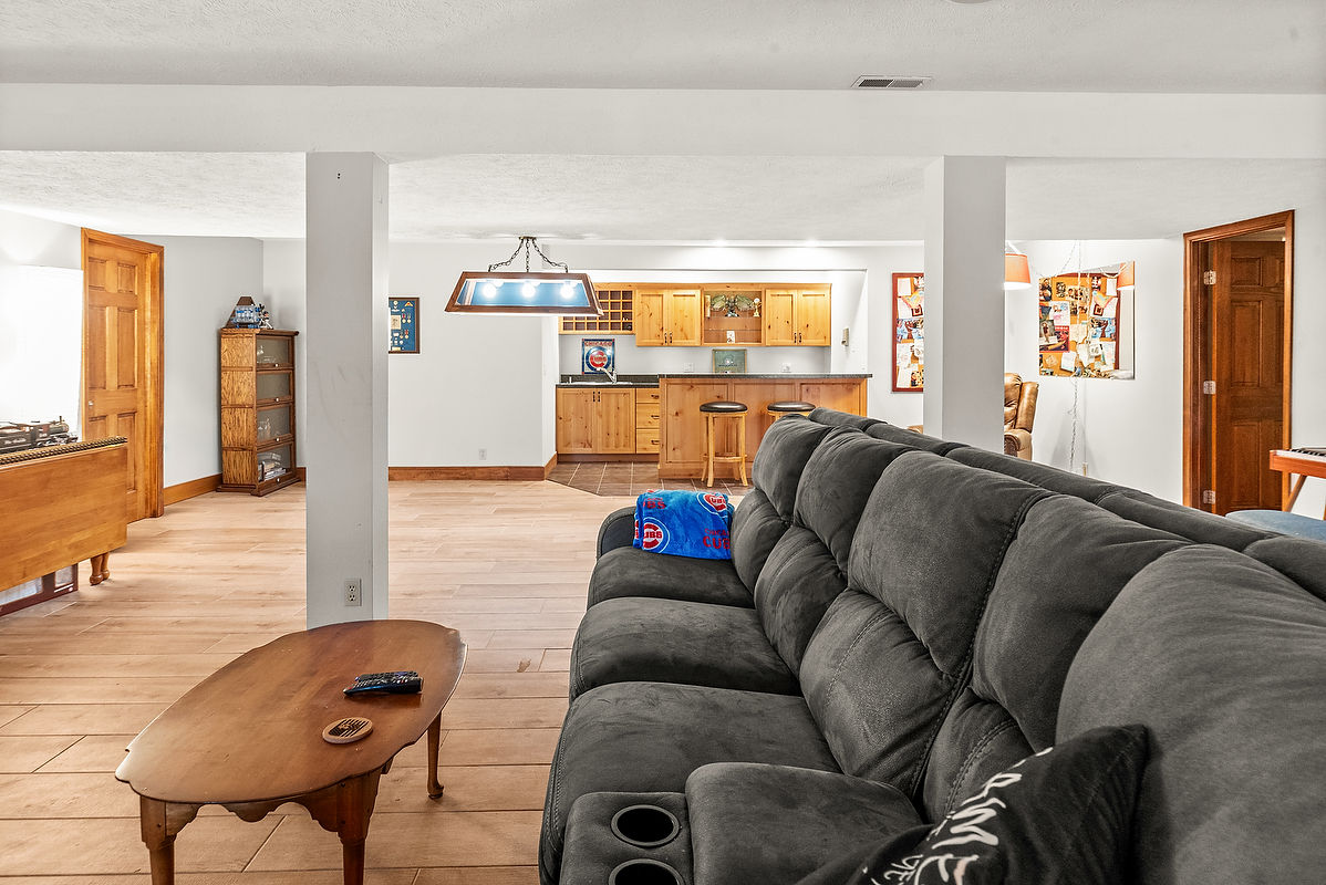 21 Pendleton Way Bloomington, IL 61704 - Photo 41 of 55 a living room with furniture and a large window