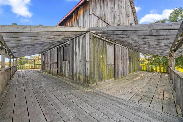 a view of outdoor space with wooden deck