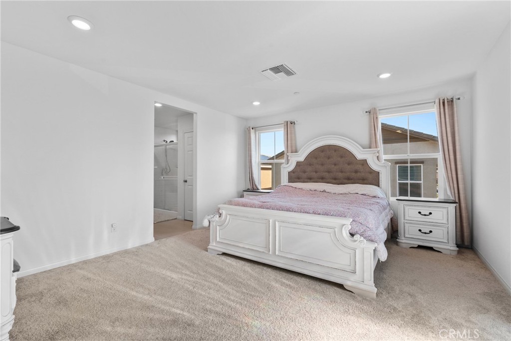 1634 Crepe Myrtle Place Upland, CA 91784 - Photo 14 of 41 a bedroom with a bed and a window