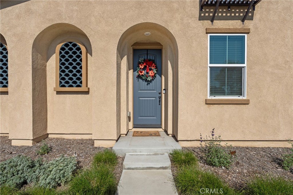 1634 Crepe Myrtle Place Upland, CA 91784 - Photo 2 of 41 a front view of a house