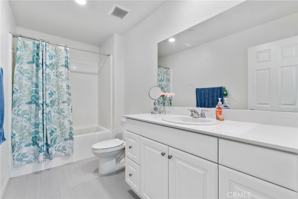 1634 Crepe Myrtle Place Upland, CA 91784 - Photo 21 of 41 a bathroom with a sink toilet and shower