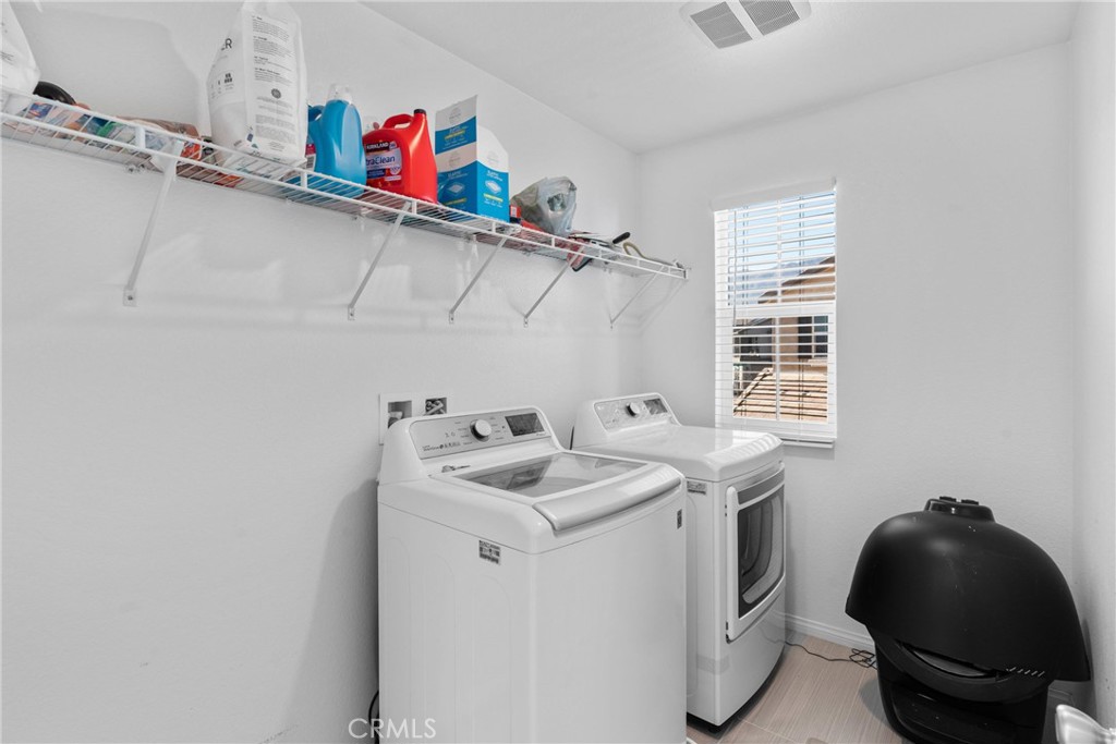 1634 Crepe Myrtle Place Upland, CA 91784 - Photo 23 of 41 a utility room with dryer and washer