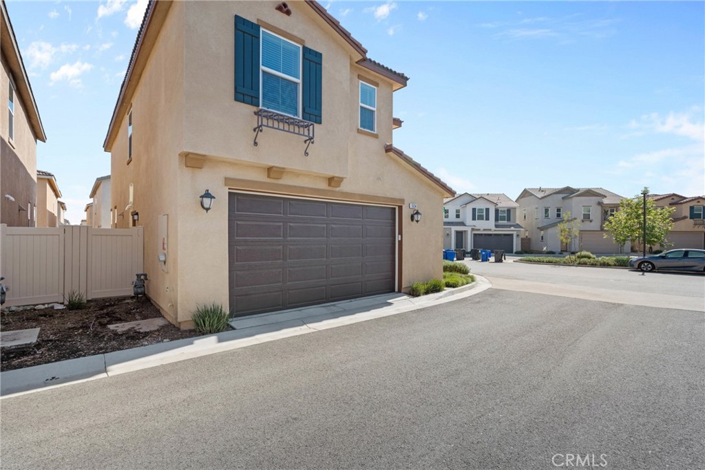 1634 Crepe Myrtle Place Upland, CA 91784 - Photo 27 of 41 a view of a house with a street