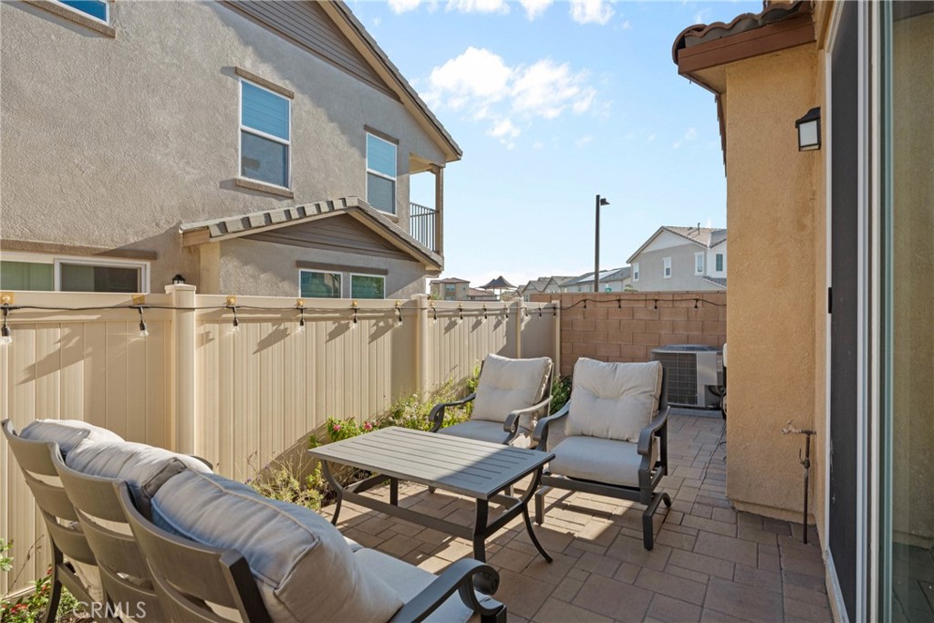 1634 Crepe Myrtle Place Upland, CA 91784 - Photo 28 of 41 a view of a patio with table and chairs