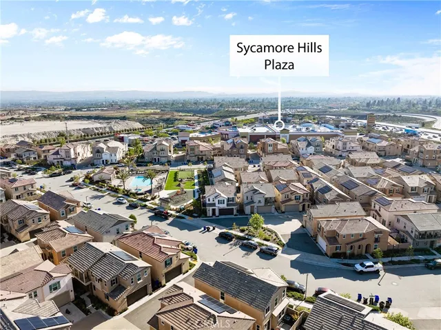 an aerial view of a city with parking space