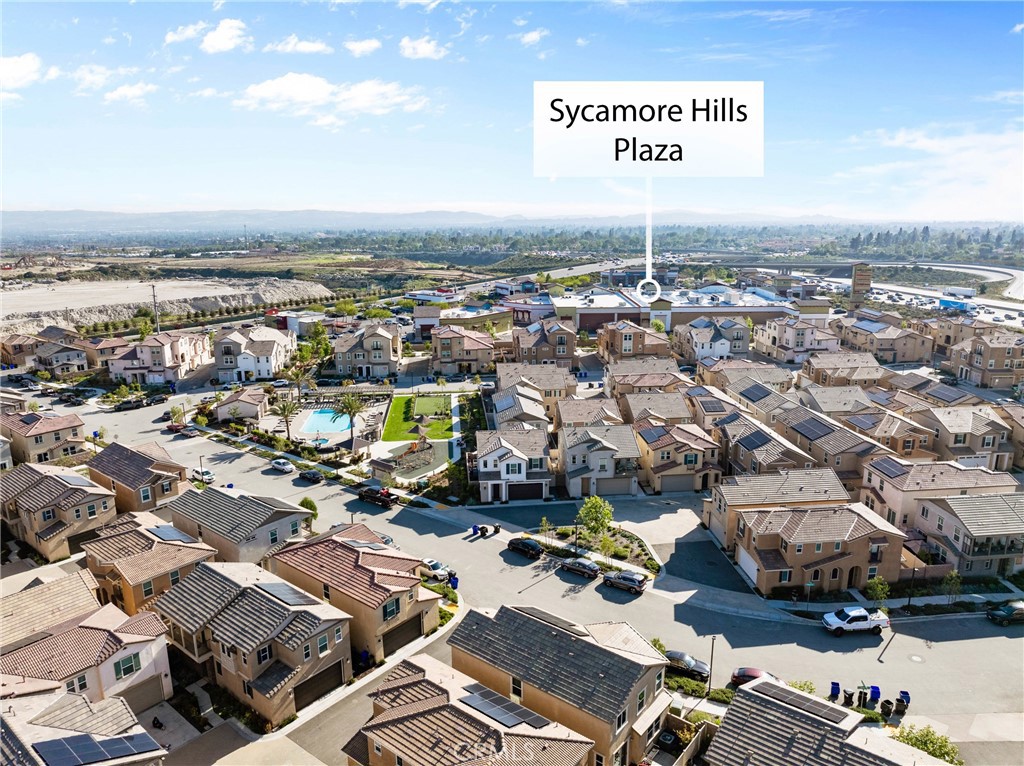 1634 Crepe Myrtle Place Upland, CA 91784 - Photo 33 of 41 an aerial view of a city with parking space