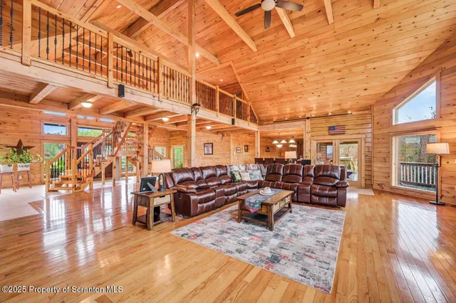 a kitchen with granite countertop wood cabinets and stainless steel appliances