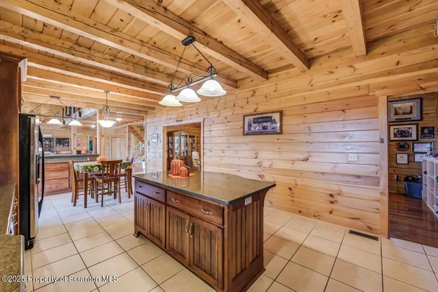 a view of staircase with large windows