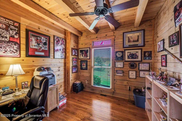 a kitchen with stainless steel appliances granite countertop a refrigerator a stove and a sink