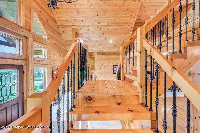 a view of water heater room with stairs