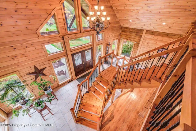 a view of a swimming pool with a yard