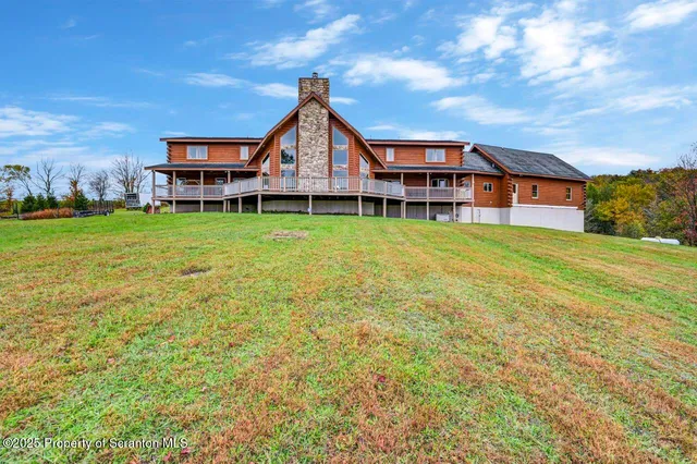 a front view of a house with yard