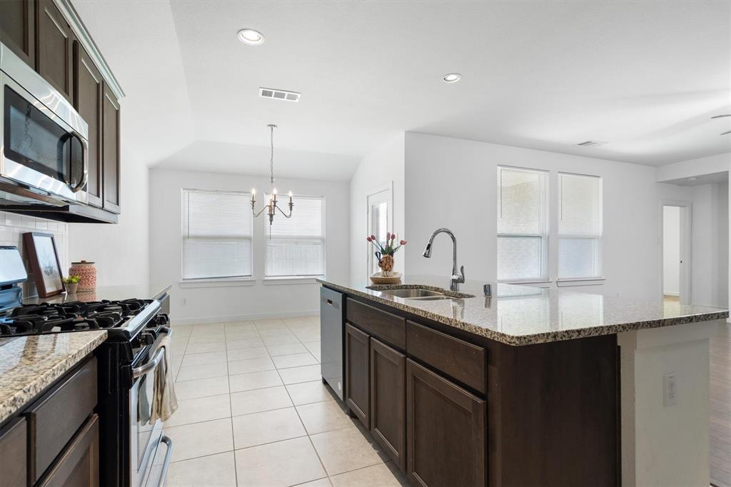 1620 Meadow Trail Lane Aubrey, TX 76227 - Photo 14 of 29 A warm and inviting spot for casual meals and everyday gatherings.