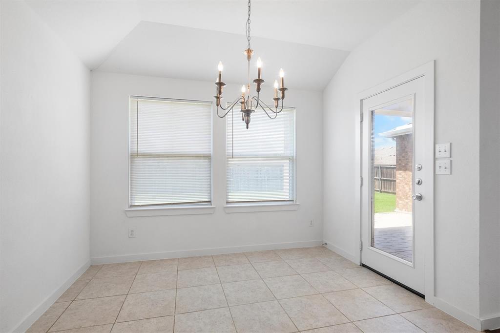 1620 Meadow Trail Lane Aubrey, TX 76227 - Photo 15 of 29 Compact eat-in kitchen space adjacent to the living room!