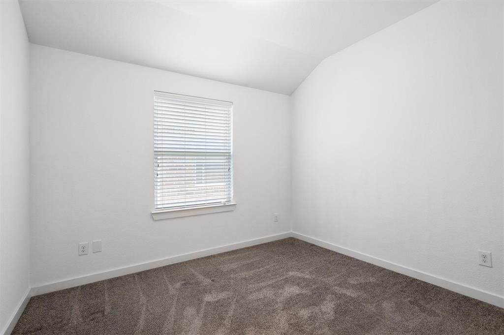 1620 Meadow Trail Lane Aubrey, TX 76227 - Photo 21 of 29 Bright and inviting guest room with soft carpeting!