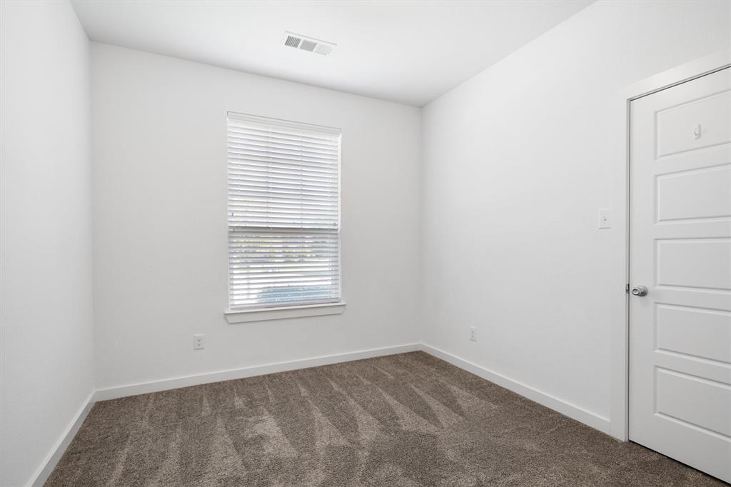 1620 Meadow Trail Lane Aubrey, TX 76227 - Photo 23 of 29 Guest bedroom offers a cozy atmosphere!