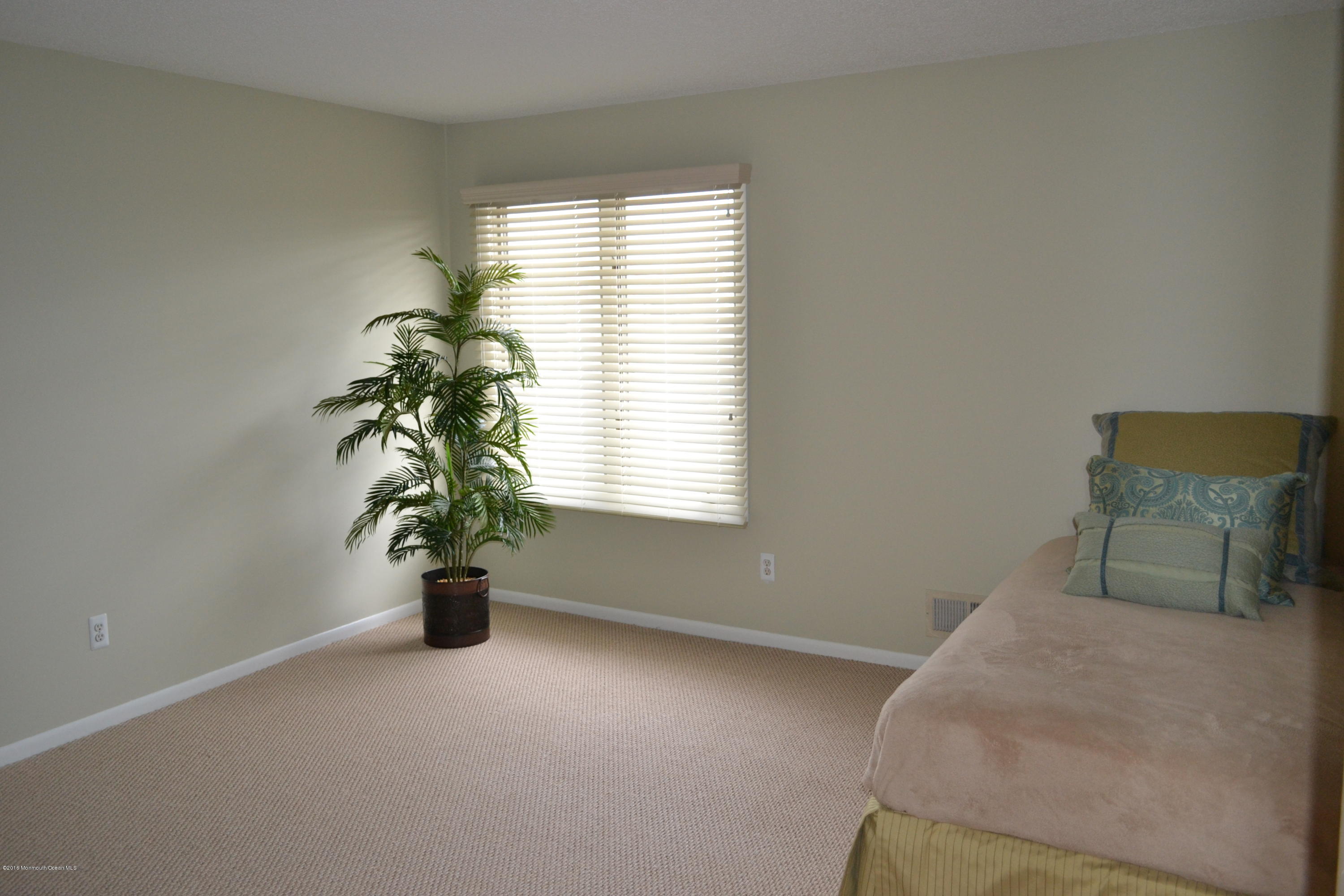 8 Hidden Harbor Drive Point Pleasant, NJ 08742 - Photo 13 of 37 a view of livingroom with furniture and a potted plant