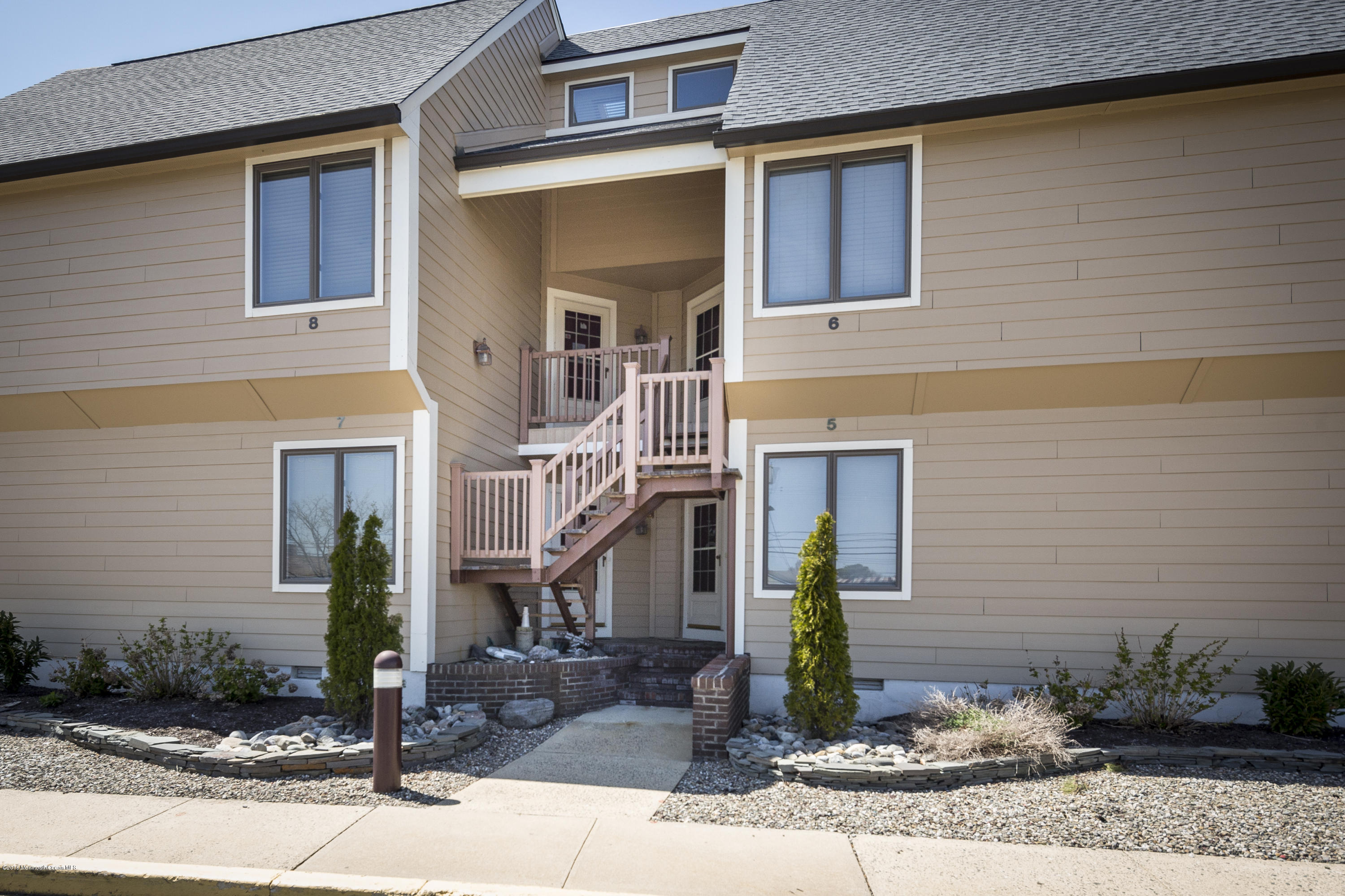 8 Hidden Harbor Drive Point Pleasant, NJ 08742 - Photo 21 of 37 a front view of a house