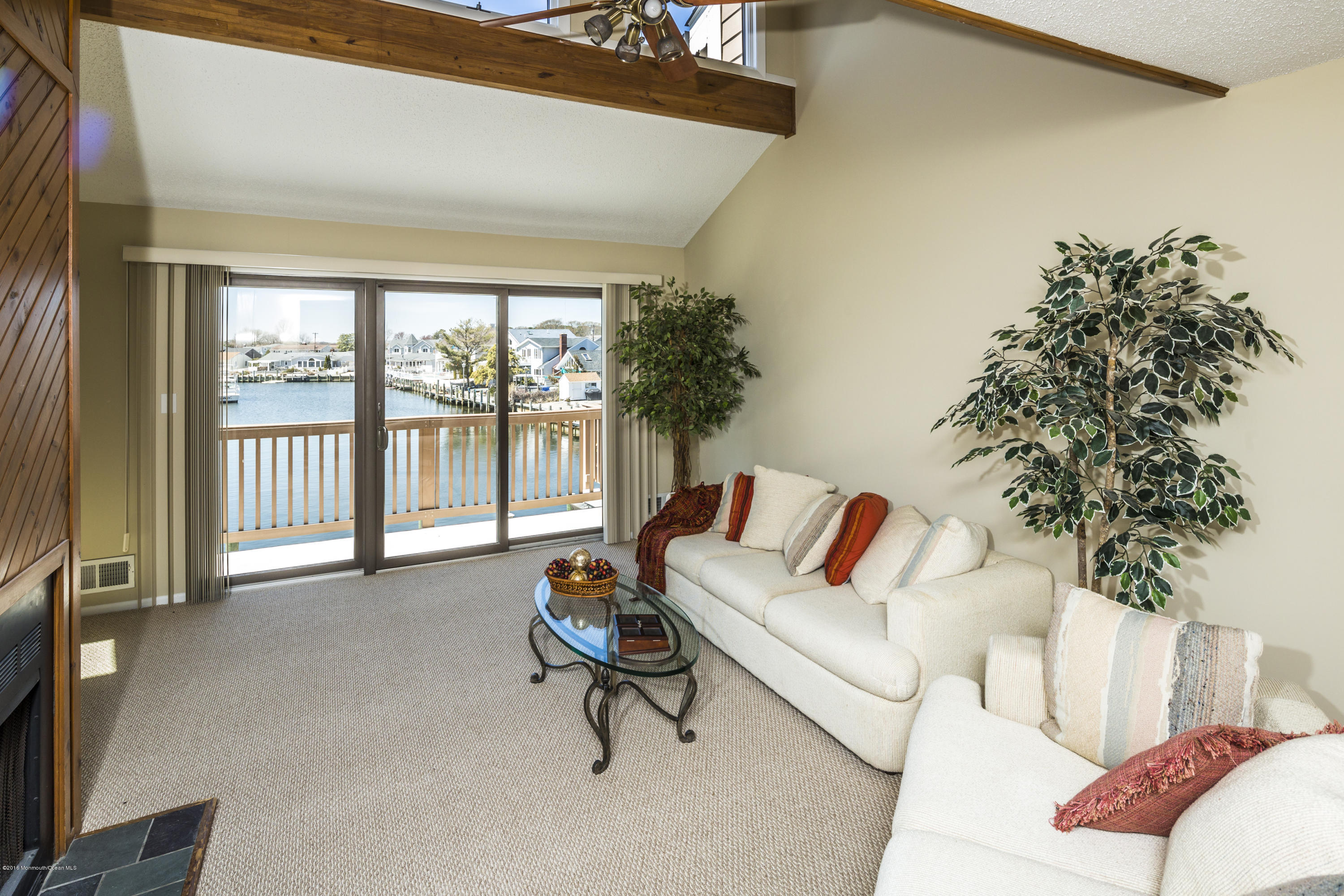 8 Hidden Harbor Drive Point Pleasant, NJ 08742 - Photo 22 of 37 a living room with furniture and a large window
