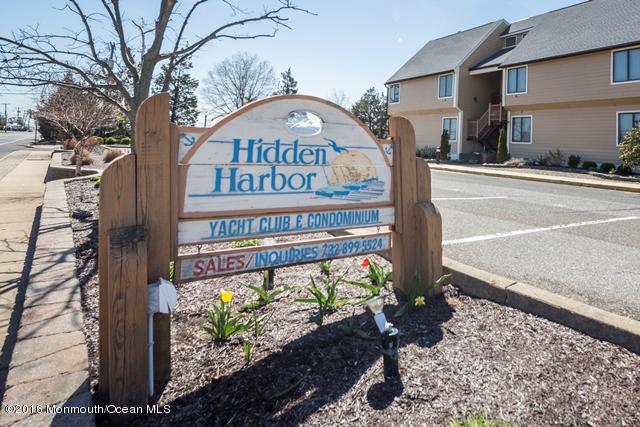 8 Hidden Harbor Drive Point Pleasant, NJ 08742 - Photo 25 of 37 a sign on the side of a road