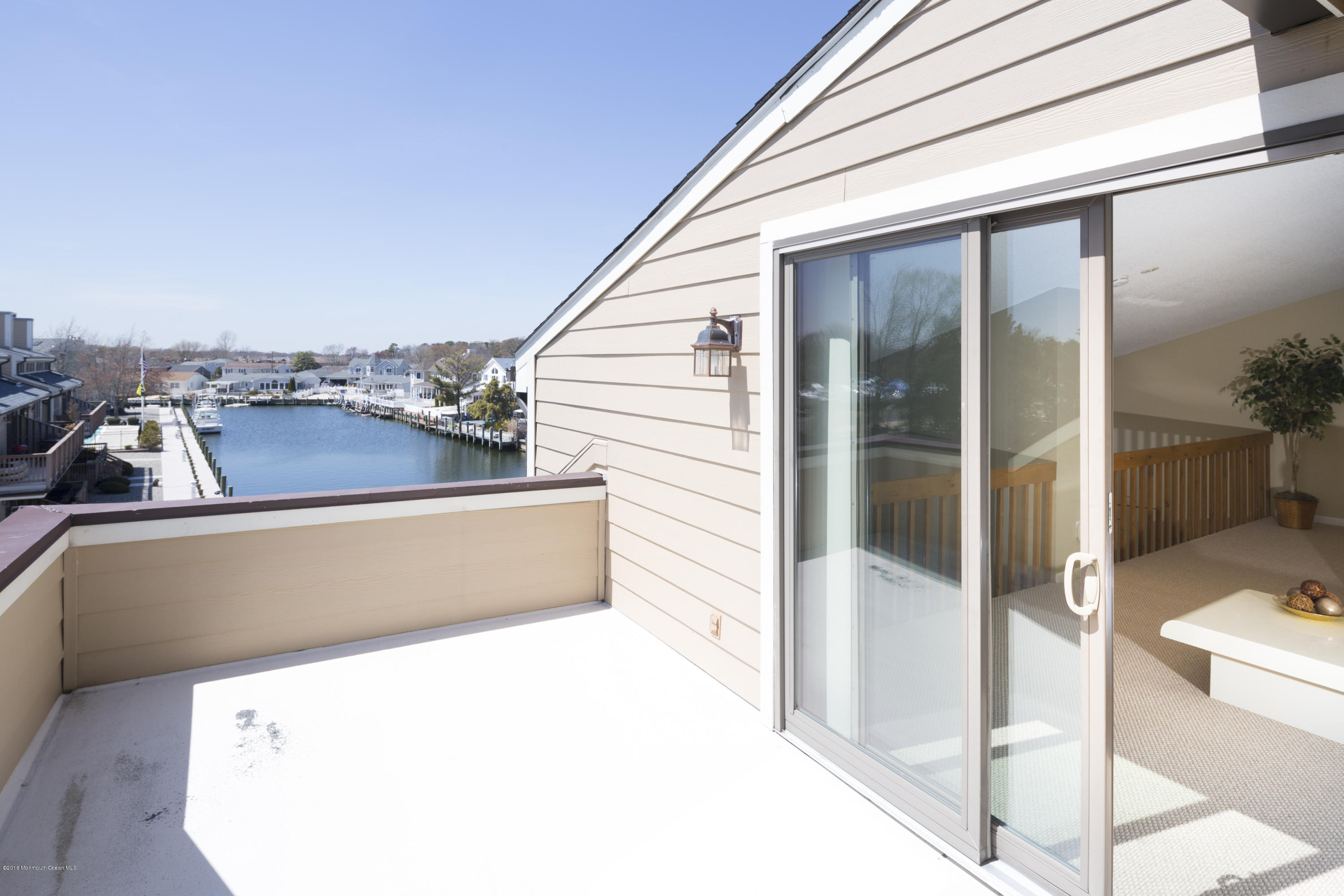 8 Hidden Harbor Drive Point Pleasant, NJ 08742 - Photo 26 of 37 a view of a balcony with furniture