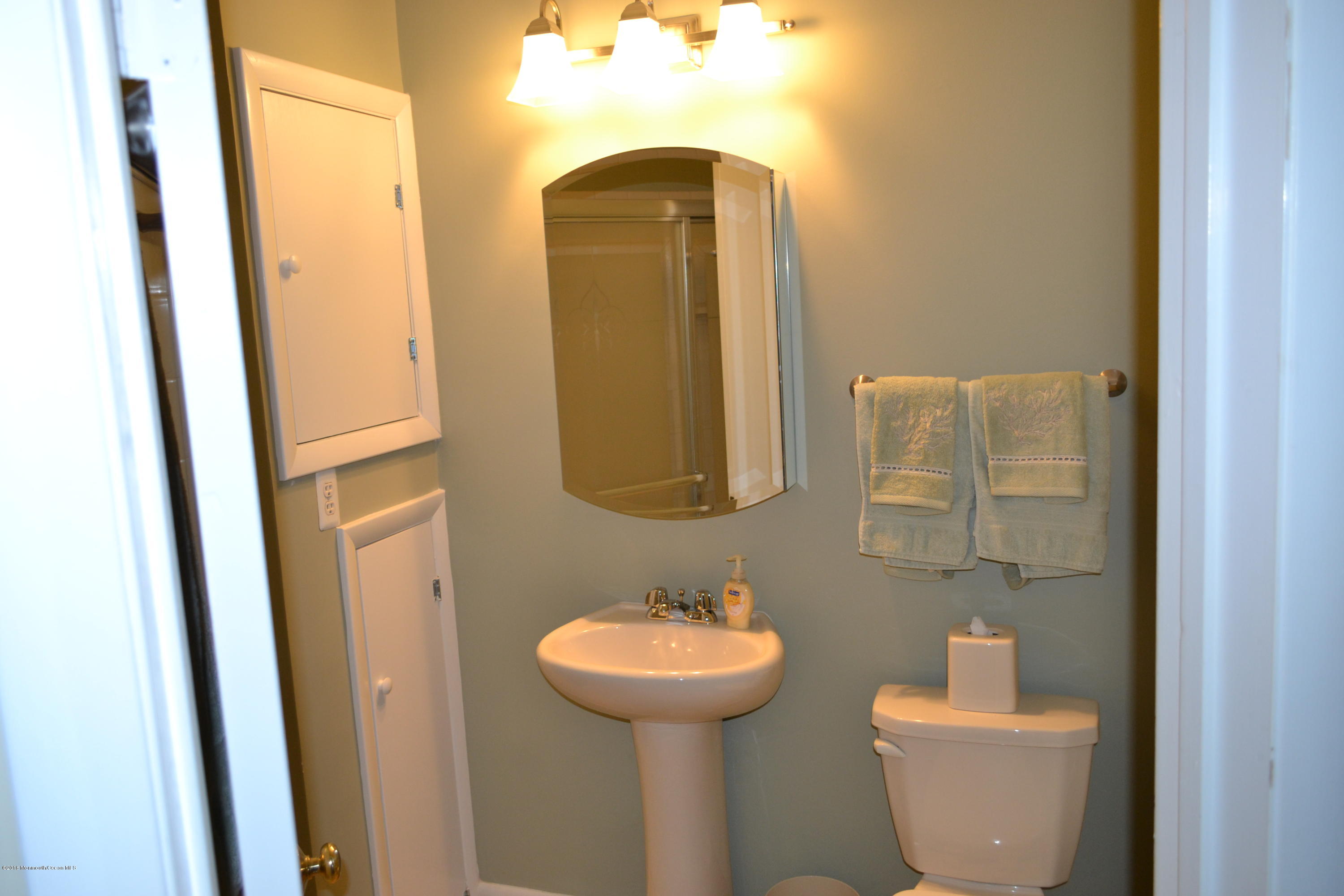 8 Hidden Harbor Drive Point Pleasant, NJ 08742 - Photo 9 of 37 a bathroom with a toilet and a sink