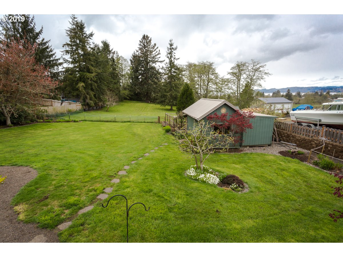 91978 Lewis And Clark Road Astoria, OR 97103 - Photo 30 of 32 a aerial view of a house with a yard