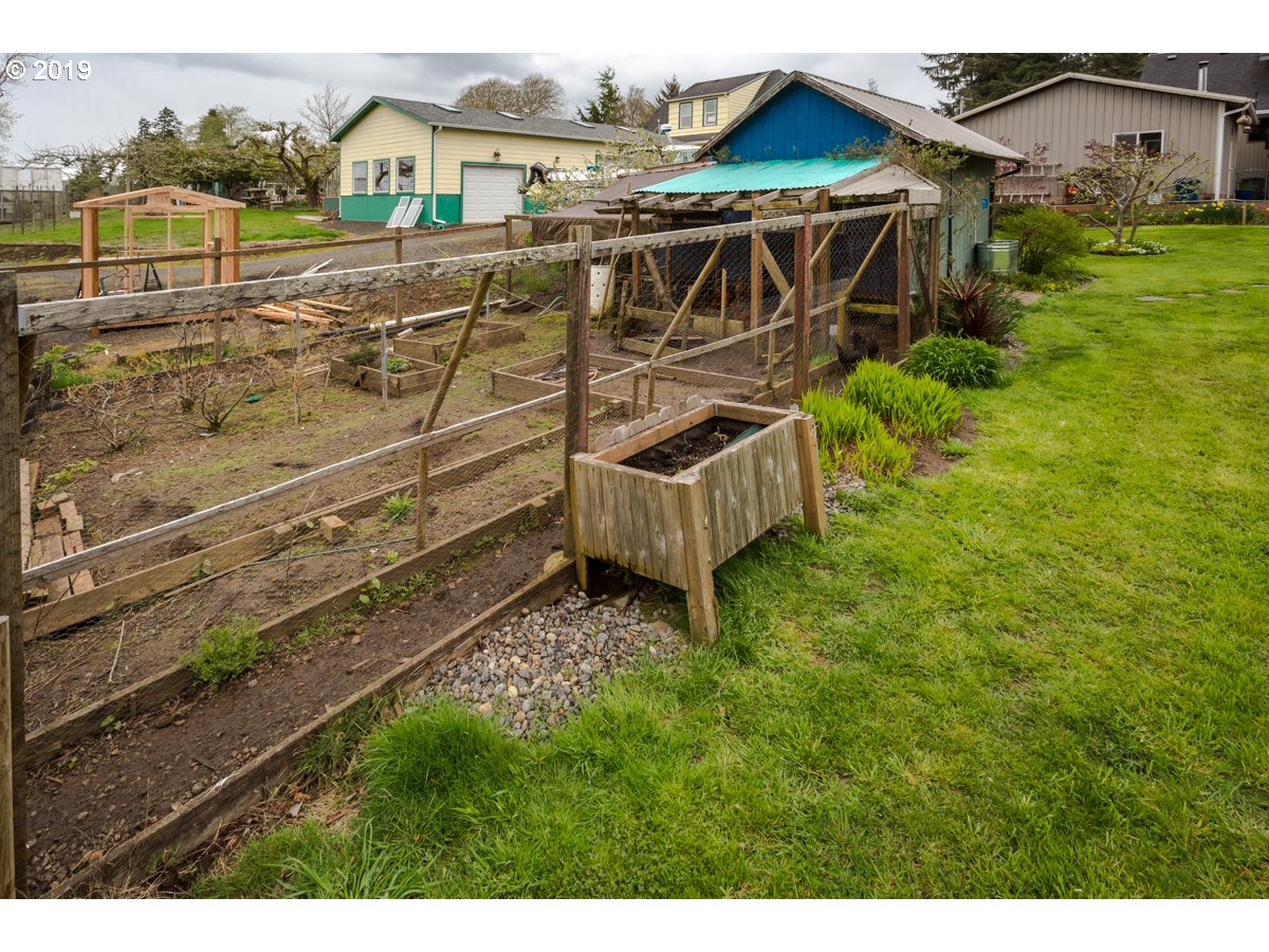 91978 Lewis And Clark Road Astoria, OR 97103 - Photo 32 of 32 a view of a backyard with plants