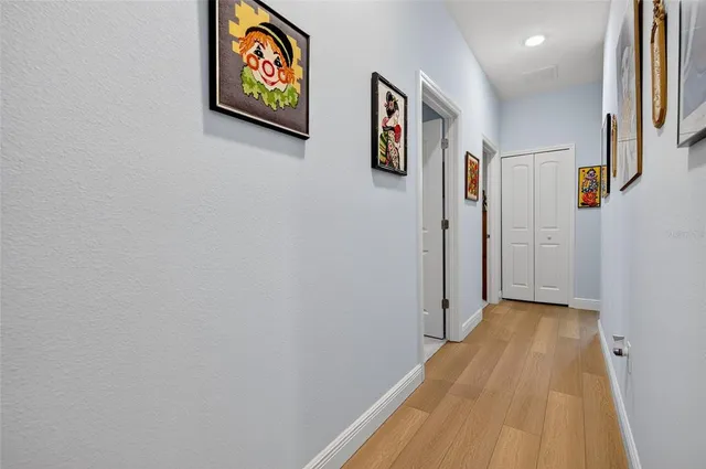 a bathroom with a double vanity sink and mirror