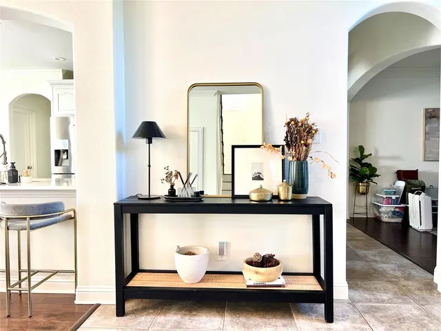a view of living room with furniture and window